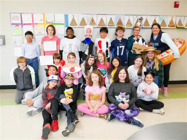 Fifth Graders putting on a Pun Fashion Show.